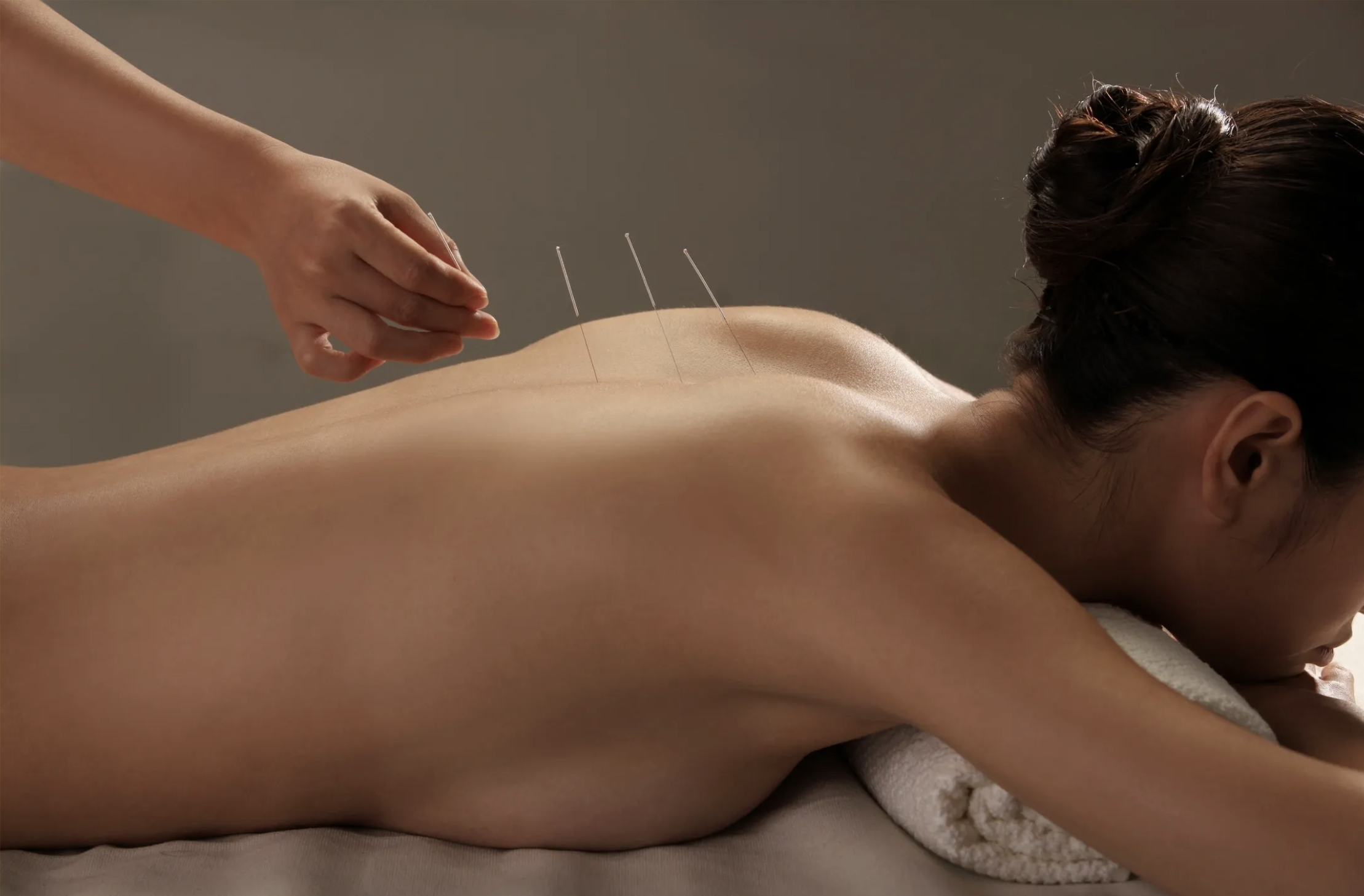 Licensed Acupuncturist Dr. Yasmin Harounian in her professional treatment room at Westwood, Los Angeles clinic